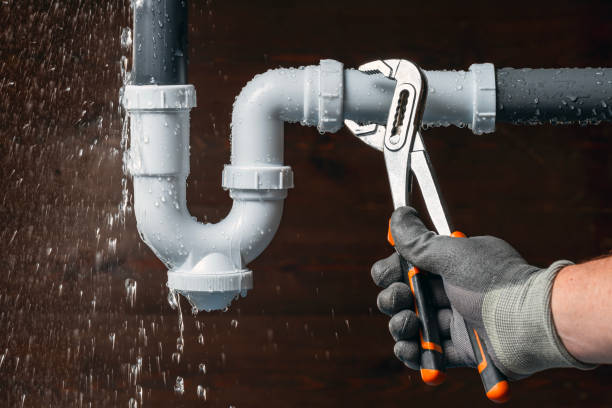 Professional Emergency Plumber technician working in Arcadia, WI